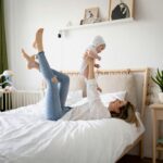 mom and kid enjoying comfort with their hvac from hutchinson hvac professionals